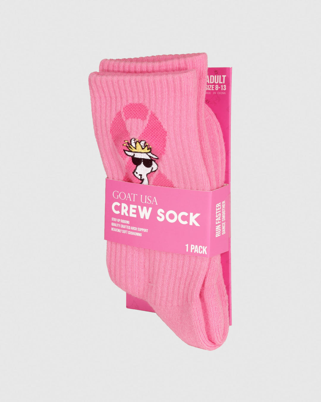 Pink socks with the Breast Cancer Awareness logo and a white goat in the packaging