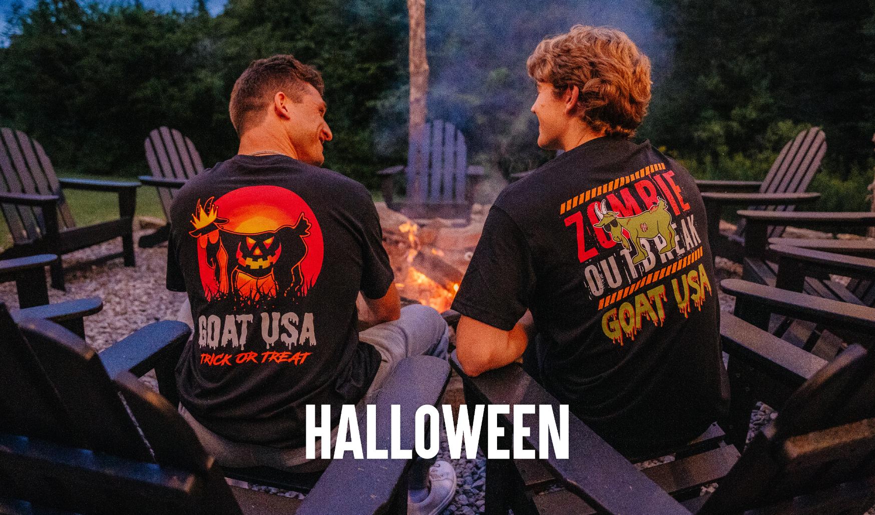 Guys sitting around a fire wearing halloween t-shirts