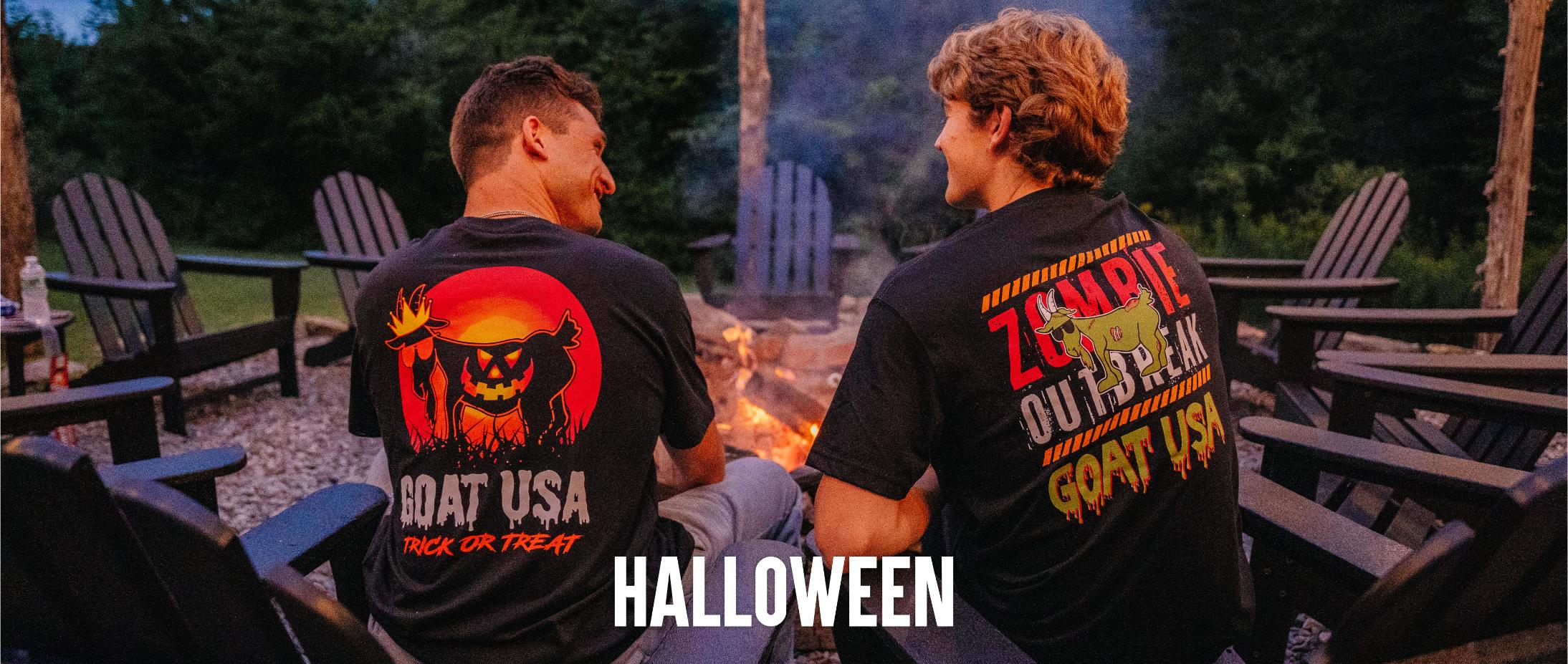 Guys sitting around a fire wearing halloween t-shirts