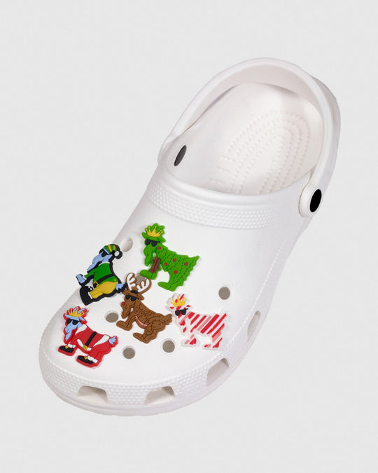 White clog with Christmas-themed shoe charms