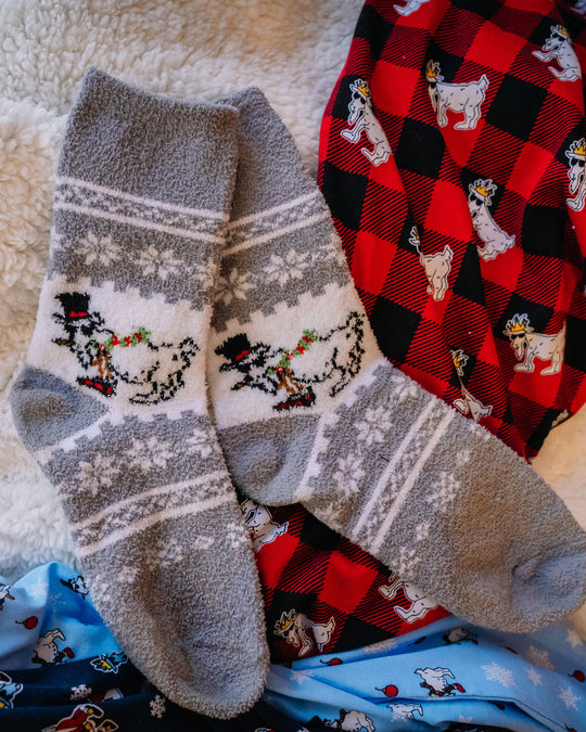 Holiday Fuzzy Socks overlaid on pajamas