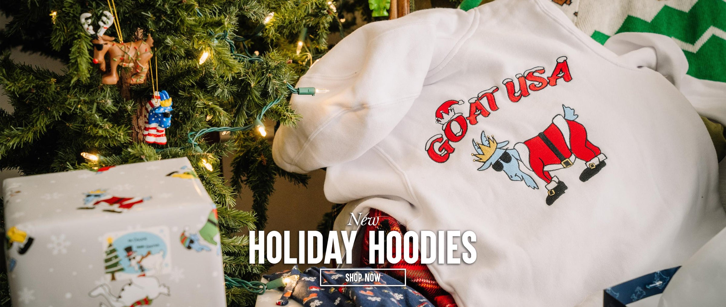 Santa Goat Hoodie displayed in indoor Christmas setting