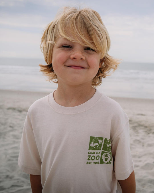 Closeup of kid smiling on the beach