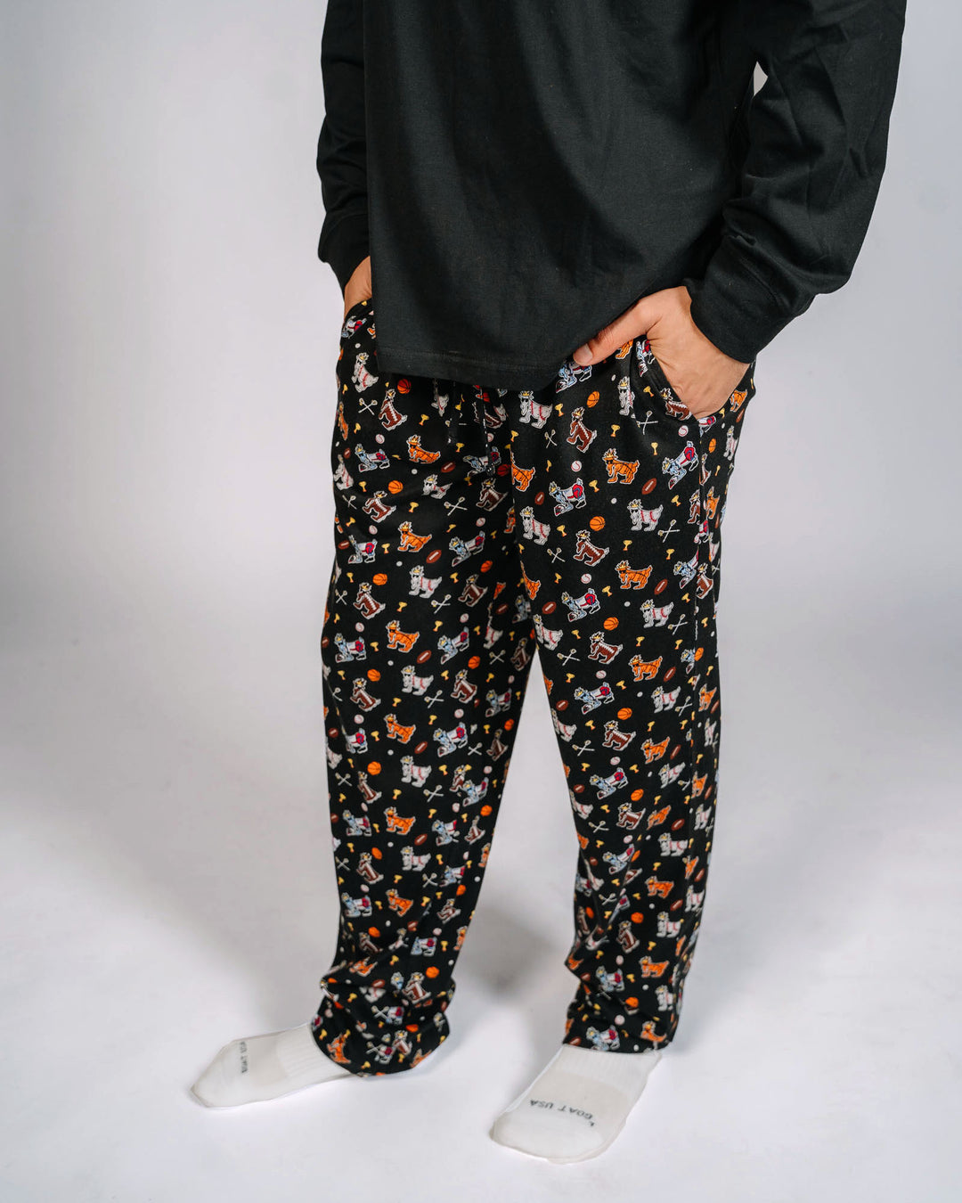 Male model wearing sport themed goat pajama pants - bottoms only