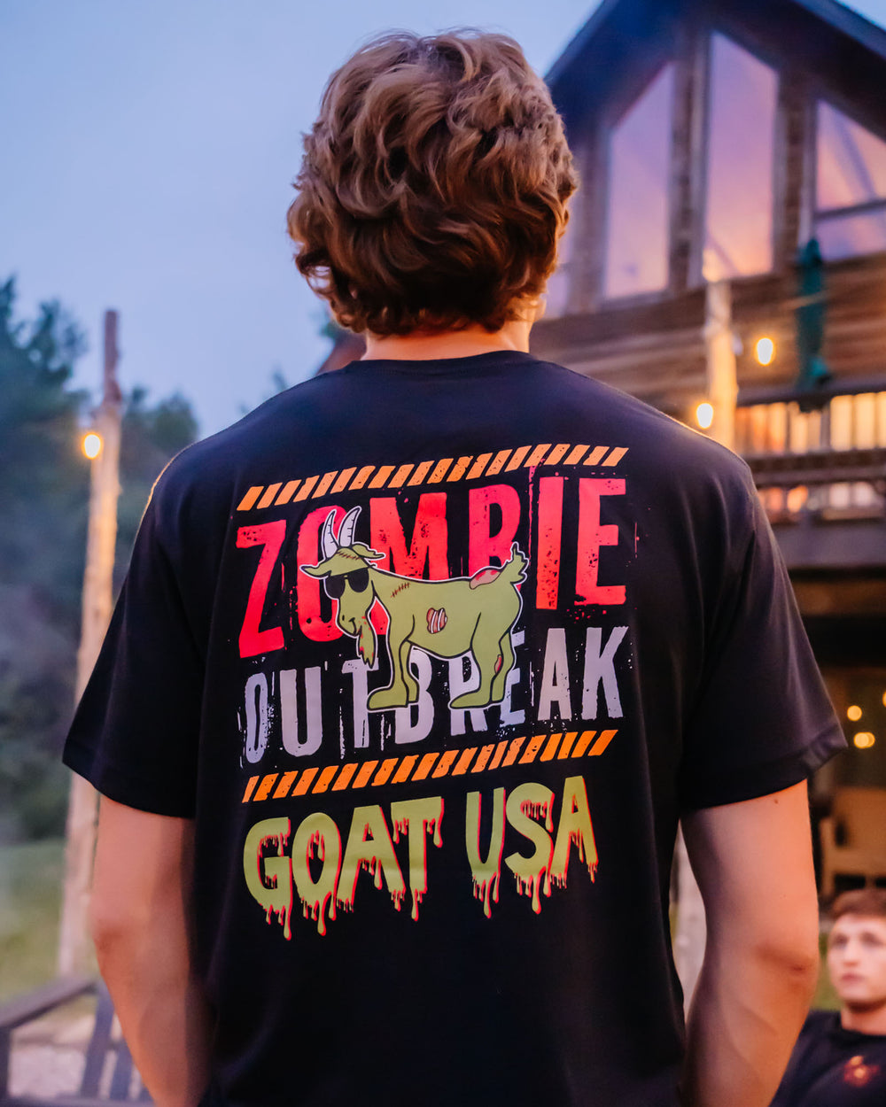 Model facing away from the camera showcasing the zombie t-shirt